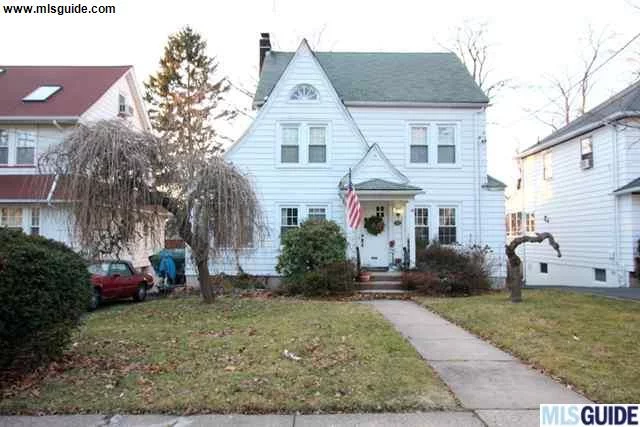 Lovely colonial. This home has pinewood floors and a fireplace in the living room. Stainless steel appliances, granite counter tops and Italian porcelain floors in the French country styled kitchen. A patio and 1 car detached garage complete this home.