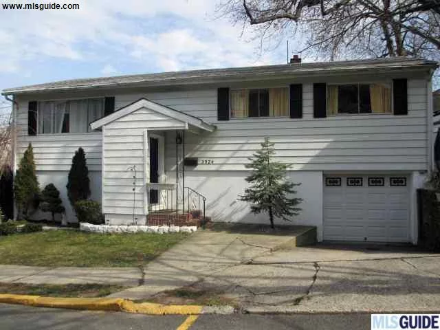 A great purchase opportunity. Spacious 1 family home with garage and driveway, finished basement, plenty of closets, hardwood floors, ceramic tiles, central a/c, 2 year old roof, renovated kitchen (6 years old), close to schools, park, major highways, bus stop and the Hudson Bergen Light Rail Station. Property sold in AS IS condition