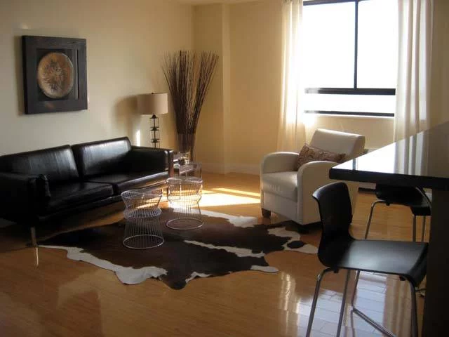 A picture is worth a 1000 words! Perfect reno-stylish/sleek: granite isle, SS appliances, Bamboo flooring-NYC and sunsets- Corner unit affording great privacy