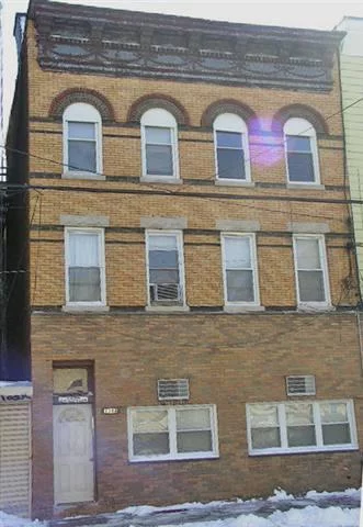 HUGE 6 FAMILY/MULTIFAMILY (6 units and bonus in basement). Building is in GREAT CONDITION! Building is always FULLY RENTED!New gas&hot water boiler.New H/w Floors.Renovated Bathrooms.HIGH RENT ROLL!Incredible neighborhood. Buses right in front. Laundry across the Street. EZ ACCESS to NYC. EZ to do GROCERY SHOPPING!Rent Roll possible $77, 448 GROSS. Rentals are #1 $971#2 $984 # 3 $1100 #4 $1100 #5 $945 #6 $1050