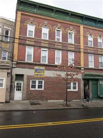 Brick building registered as a 5 family. There are 6 separate apartments in the building 4 rooms each. Four apartments currently vacant and 2 occupied. Separate boilers Please see Associated Documents for Listing Addendum