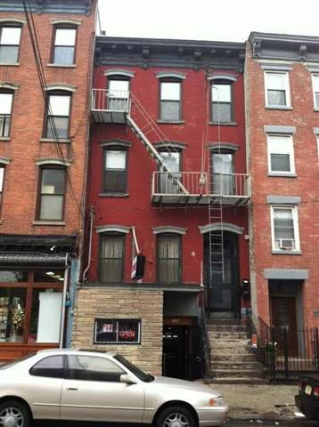 Beautiful upgraded 3 family with a commercial space on 1st Fl currently being used as a Restaurant. (2) 1 bedroom apts (1) 2 bedroom. Great rental income!