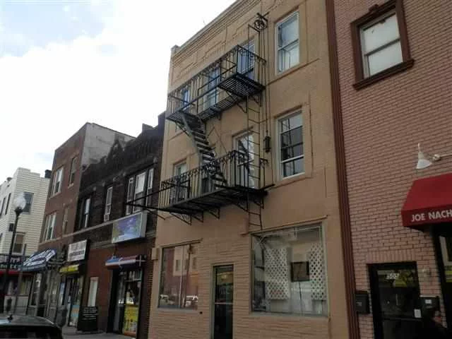 Calling all investors start your nest egg here. Great Central Avenue location. Brick mixed use building. 4 Residential units and 2 commercial units. Separate heat, hot water, gas and electric for all units.