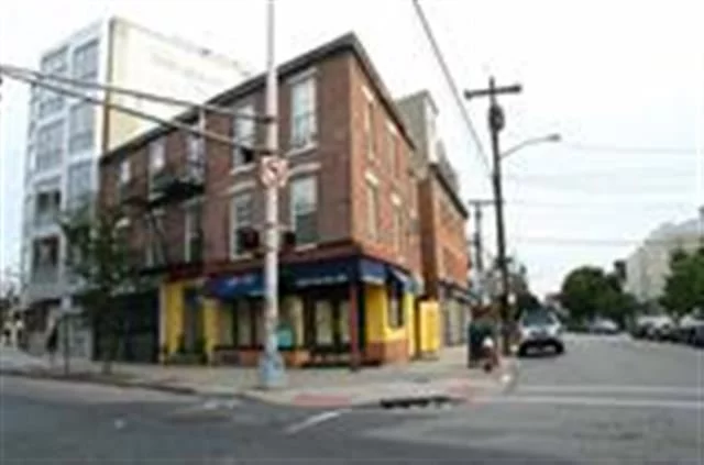 Good investment property. Four apartmenst and two retail spaces. Prime downtown area.