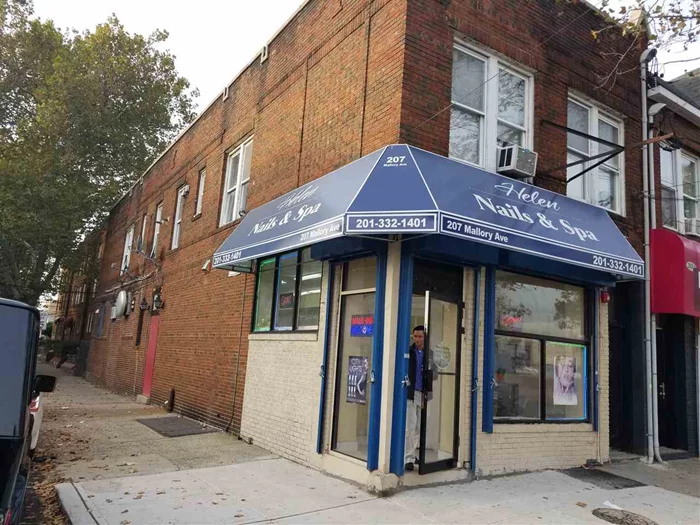 Profitable all brick corner property with commercial space and two 2 bedroom units above. Located in Jersey City/West Bergen. Hudson Mall and Lincoln Park short distance away. Close to schools, houses of worship, public transportation, and shopping. Property comes with a finished basement.