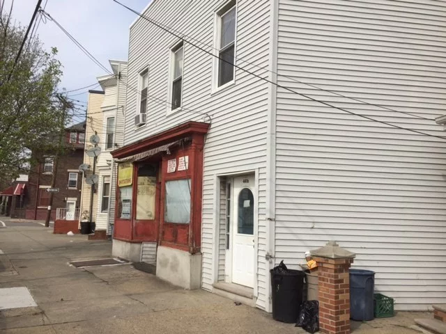 Great investment mixed use property. Studio, two one bedrooms plus commercial spot. Sold as-is. Fixer upper.