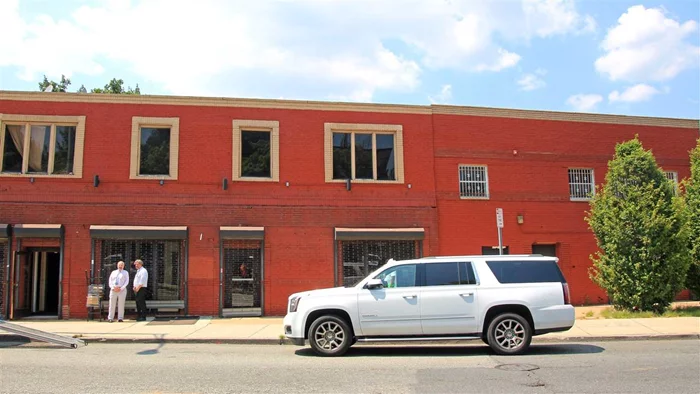 This building is a 2 story brick building that was previously used as a restaurant/bar. The property is in the Martin Luther King Dr Redevelopment plan which gives you the right to build up to 4 stories with retail on the ground floor.