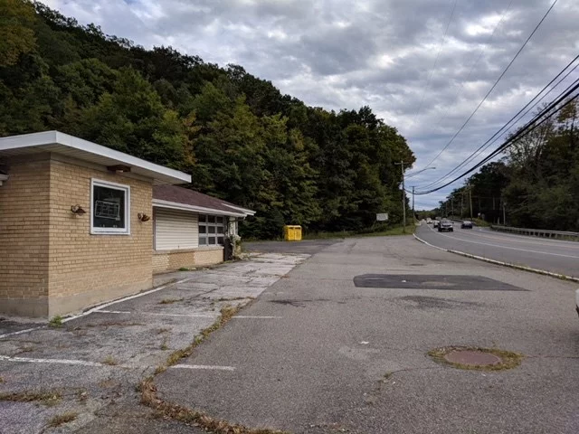 Over 3 acres of land on a major road. High exposure to traffic, opportunity to build your business awaits. Frontage to highway over 310 feet. Over 40 parking spaces, this property is ready to build.