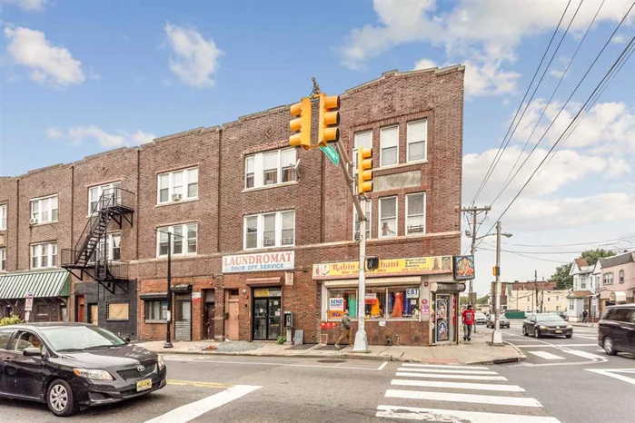 This amazing MIXED USE property has a 7% PLUS CAP RATE!!! Nestled in the heart of booming West Bergen, this building features a commercial unit (Laundry mat) currently rented for $2, 500, and two 3 bedroom 1 bathroom rental units. 2nd floor unit #1 is tenant occupied for $1, 800 a month. 3rd floor unit is currently vacant and was collecting $1700 monthly. All separate utilities for each unit, make this opportunity even more attractive for the buyer!!! Taxes are only $6, 503 Incredible location right on the corner of Communipaw Ave! Bus stop in front of the building, easy access to NYC.