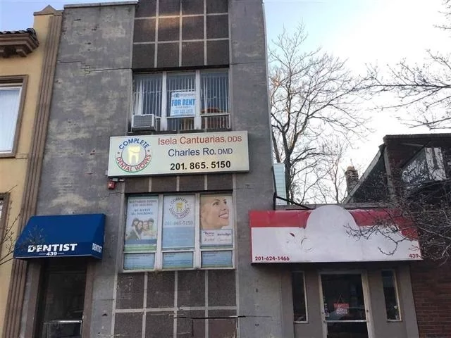 Great commercial building across from West New York City Hall. Located in high traffic area off Bergenline Ave. Perfect for professional use or developer. Prime location 25x100 lot with many possibilities. Two separate levels of office space approximately 1300 sq. ft. with bonus commercial space attached.