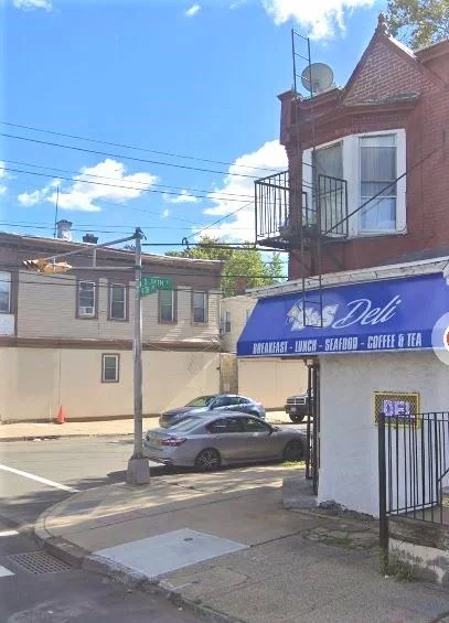 Great investment opportunity. Corner lot investment property with a restaurant on 1st floor, a 2 bedroom apartment on 2nd floor, 1 car garage and billboard on the side of the building.