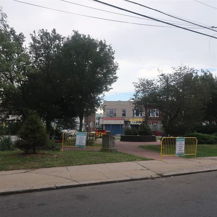 2 Store front on the corner of Cator and Rose Ave, one store on Cator side, plus 2 six rooms residential units above the commercial units across from Triangle Park.  Great income producing property.