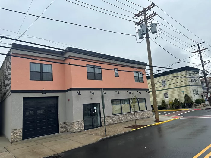 Located in the bustling heart of Secaucus, this prime mixed-use property boasts 2, 300 sq ft ( approx ) ( Vacant ) on the ground floor, ideal for a grocery store or restaurant. Upstairs, discover two spacious 2-bed/2-bath residential units (Occupied) plus office space on the second floor is an accessory use to the commercial space (Vacant). Convenience is key with four dedicated parking spaces, including wheelchair accessibility, and a dedicated garage for the commercial unit. Explore endless possibilities in this dynamic property at the center of it all.