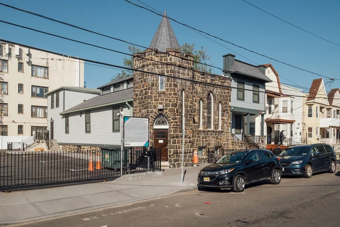 BEAUTIFUL GOTHIC CHURCH STYLE BUILDING CONVERTED TO MODERN OFFICE SPACE. ORIGINAL DETAILS REMAIN WITH STAIN GLASS WINDOWS, GOTHIC TOWER AND CEILING HEIGHT. LARGE PARKING LOT PLUS A 3 FAMILY HOME FOR EXTRA INCOME. UNIQUE PROPERTY ON KENNEDY BLVD. AND STEVENS AVE.