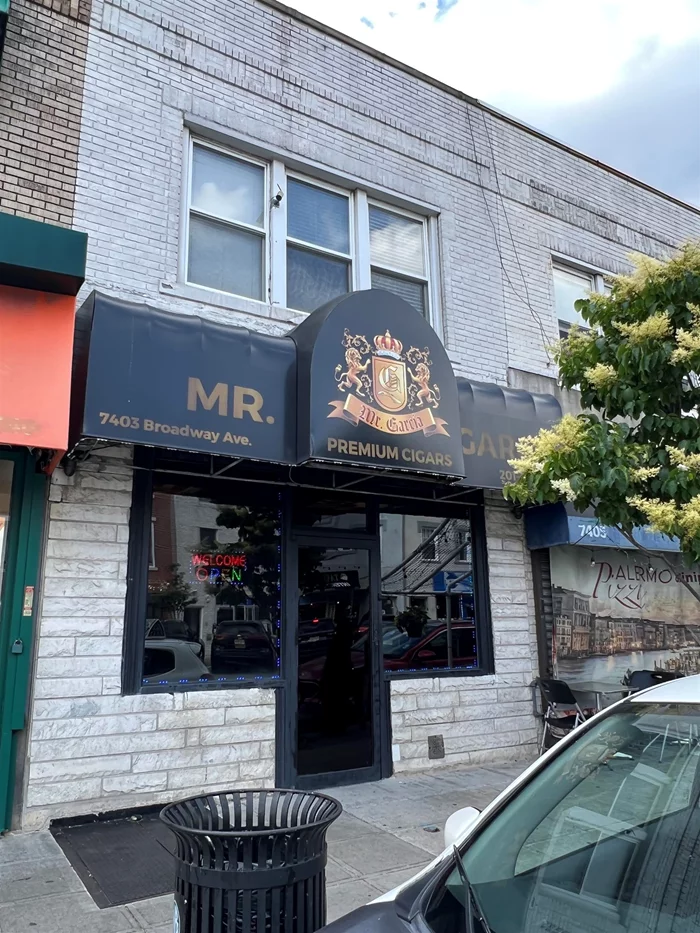 Mixed Use property with a two bedroom apartment on the second floor and smoke shop with lease expiring in two years.