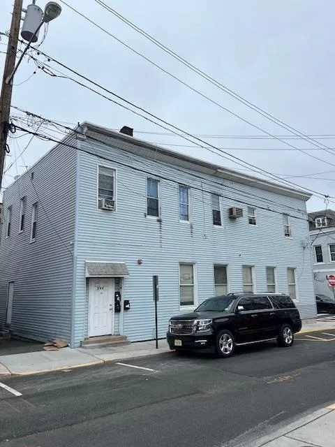 Corner Investment property with One Parking space 1900 sq feet Commercial space plus a one-bedroom apartment and a three-bedroom apartment all separate utilities great location.