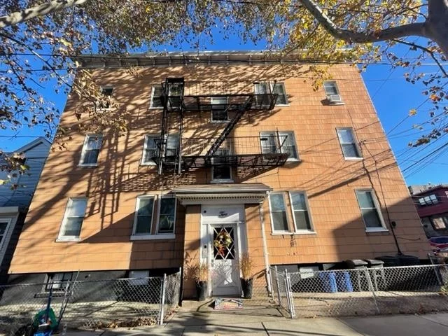 CALLING ALL INVESTORS! HOT..Journal Square area charming 6 Family Corner location AKA 94 Stuyvesant Ave is fully occupied MTM rentals w 3 renovated apts plus a newer gas boiler,  Rheem hot water heater, recent roof silver coating plus bubble skylight w expansive views of the surrounding areas. Family owned and maintained 50+years. Apts measure 675 square feet each plus full basement w a private side entrance, utility room and extra full bath, hi and dry brick walls. Buzzer intercom entry w double door security. Oil Tank removal 2023 w state certification plus valid State certificate of inspection.Basement plumbing prep work in place for separate gas heating systems (buyers responsibility.) Currently one gas boiler. Conveniently located 5 blocks to Journal Square, currently undergoing a transformative redevelopment, improved NYC transit connectivity Path trains and bus transit plus cultural entertainment options. Incredible opportunity awaits ... Wont last!