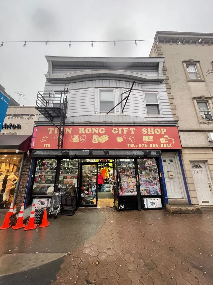 This property is located in the center of the Ironbound District of Newark, featuring one commercial storefront and two residential apartments, all currently rented on a month-to-month basis. Each unit has separate utilities, offering easy management and maintenance. With a full basement for extra storage, this property provides flexibility for both business and rental income. The Ironbound District is known for its cultural diversity along with excellent dining and retail options. It's well-connected by public transportation, with easy access to Newark Penn Station and major transit lines to New York City. Newark Liberty International Airport and major highways are also just minutes away, adding to the convenience. This property offers a unique opportunity for investors or business owners looking to take advantage of a dynamic, well-connected location.