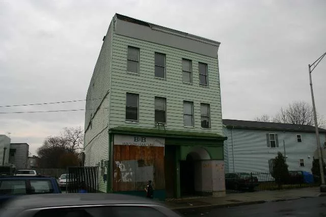 CONTRACTORS SPECIAL BLDG HAS FULL LOT COVERAGE 2 COMMERCIAL ON GROUND FLOOR PLUS 3 BR APARTMENT ON 2ND AND 3RD FLOOR NEEDS TO BE REHABILITATED.