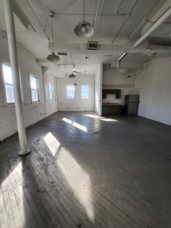 Bright, clean industrial loft for lease. Unit 4A is approximately 900 sq. ft. and suitable for office, warehouse, small business start-ups, storage, artist/photographer/creatives, distribution. Not suitable for food preparation and high-traffic retail. Well-maintained building with landlords onsite daily, 12' ceilings, abundant natural light, two freight elevators, loading dock, central heat, 24/7 access. Close to JSQ PATH with easy access to Holland Tunnel, Newark Airport and major highways to everywhere. Monthly rent includes all utilities. Immediate occupancy. Call today to schedule your private showing.