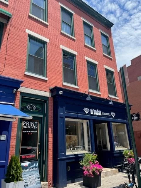 2nd floor office of one most heavily walked corners in Hoboken. 2 room office space (one much larger) with private bathroom. Currently used as a thrift store. Get nice light, with many windows. Many possibilities for the space. Get location, steps to path.