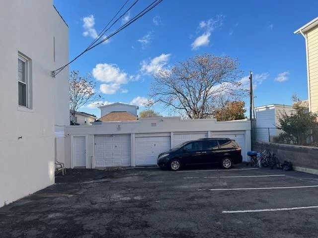 Ample parking spaces. Four covered garages and 5 open parking spaces. Covered garage can be used as Tools, car storage, etc. all 9 spaces must be rented out together to just one renter.