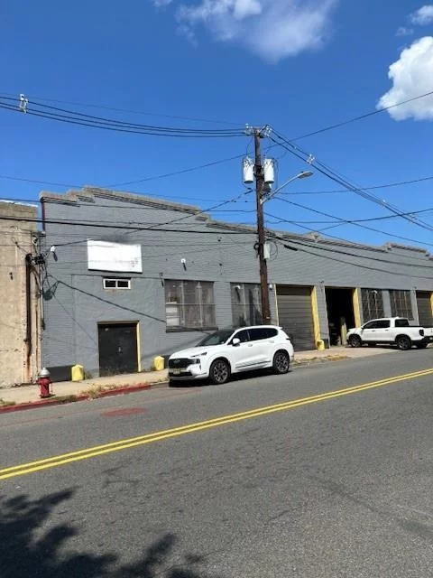 LARGE BRICK COMMERCIAL GARAGE LOCATED IN THE GREENVILLE SECTION OF JERSEY CITY. 14, 269 SQ. FT WITH 12 FT BAY DOORS ON OCEAN AVE AND OLD BERGEN ROAD.