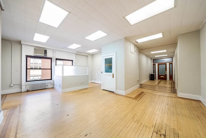 Professional office with great floorpan. Four private offices with lots of natural light, open area and vault great for storage. Fireplace, bookshelves, Hardwood floors throughout. Perfect for start-up venture, professional services, attorney, therapist, accountant office etc. Hoboken Land Office building one block to Path Train on the corner of Newark St., 1/2 block to Path, Trains, Busses, Ferry and Taxis. Restaurants, banks and post office.