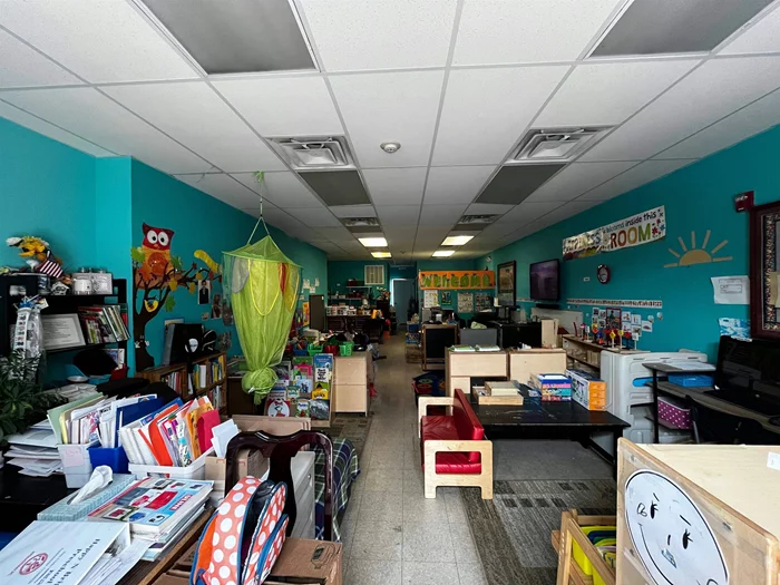 Located in the vibrant, growing Mcginley section of Journal Square in Jersey City, this versatile 750 sq. ft. commercial space at 180 Duncan Avenue offers endless possibilities. Currently operating as a daycare, the space is zoned for retail use, making it ideal for a variety of businesses such as a boutique, coffee shop, salon, dispensary, office, etc. The property also features a spacious 700 sq. ft. private backyard, perfect for outdoor dining, storage, or an additional customer experience area. The interior is welcoming, complete with a half bathroom and handicap accessibility, ensuring convenience and comfort for all patrons. This storefront property has great foot traffic and easy access to major highways and public transit, this location offers both exposure and accessibility. Whether you're looking to expand an existing business or start a new venture, this is an ideal space in one of Jersey City's most sought-after areas. Washer/ Dryer in basement. Daycare is also for sale. Inquire with LA. Close to Journal Square PATH, bus to NYC via JFK Blvd, St Peter's College, Lincoln Park and all McGinley Square has to offer.