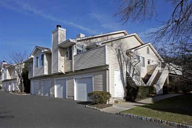 End unit condo for sale in the spectacular Fieldstone section of The Hills. This 2BR/1Bth gem features a state-of-the-art kitchen gleaming w/ granite countertops. Custom cabinetry, sub-zero refrigerator & freezer, Viking appliances & elegant wine cabinet. Charming french doors lead the way to the 2nd BR. Spacious master BR is accented by xtra sink-vanity outside the luxurious walk-in closet. 1 car attached garage! This fabulous condo is ideally situated mins fr gym, clubhouse, tennis courts & pool.