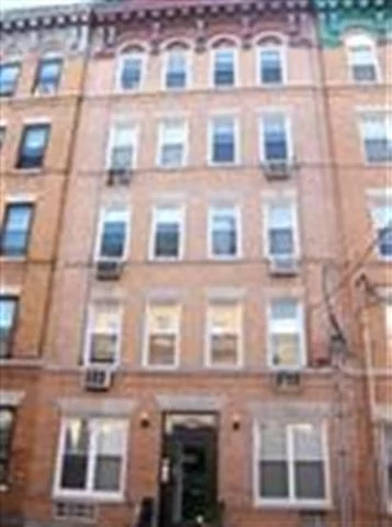 Large One Bedroom-Top Floor-Rear of the Building-No Street noise.Hardwood Floors in the Living/Dining room, carpet in the bedroom. New Ceramic tile bathroom. More Closet Space/Storage then you will know what to do with. Built in Book Shelves in the Living Room. NYC Bus stops on your corner, also near to a pharmacy/cafe/restaurants, and a park. Free Full size Washer/Dryers in the basement