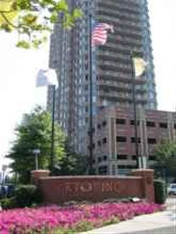 This spacious high floor 2 bedroom condo at The Portofino features h/w/ floors, breakfast bar, washer/dryer in unit, good closet space, river and NYC views, private balcony, 1 car parking and that's not all...Building amenities include 24 hr concierge, gym, community room, pool with sun deck, garage parking, playroom, high speed internet and more!