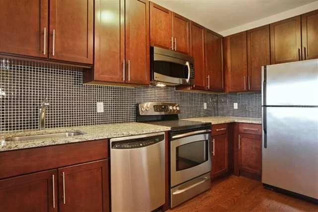 This lovely upgraded, 740 sf studio is designed to live like a 1 bedroom. Enjoy warm wood floors and soaring 13ft ceilings. The gourmet kitchen is equipped with new ss steel appliances and sleek granite counter tops. Grab a peek at the Hudson River from 11. 9 feet windows. The Hudson Tea community offers 24 hr concierge service, luxury residence's lounge, gym, playroom and shuttle service to PATH trains. Paid parking available in on-site lot.