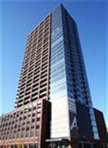 Spectacular 1 BR1 Bath Condo in the New 'A' Condominiums Hi-Rise. Enjoy spectacular NYC & Hudson River views, stunning high-end finishes, gourmet kitchen, designer bathroom, in-unit washer/dryer. Maintenance includes Heat, Hot Water & Gas, Doorman, Concierge services, Gym, Community Lounge & Patio! Unit includes 1 over sized parking space.