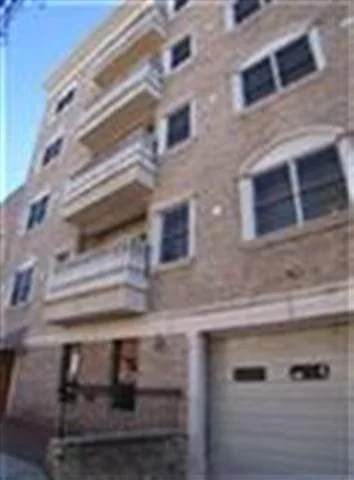 Spacious 2 bed 2 bath condo with balcony. Large home features a spacious living / dining room with plenty of space to entertain. Split bedrooms are both generously sized, one with walk in closet and en suite bath. Sliding doors step out onto your peaceful terrace facing the rear of the bldg. Very low taxes and fees. One oversized garage parking space included!