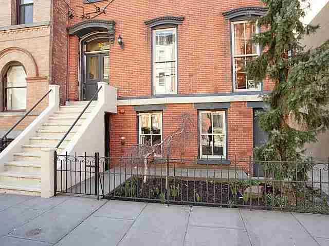 Rarely available, a gorgeous condo in a historic brick row house with parking! Located in a boutique four unit building this home offers two spacious bedrooms, open kitchen with separate dining area, large living room, and direct access to patio with BBQ and pergola. Other notable features are hardwood floors, central air/heat, and a stunning new bathroom with a full wall of glass mosaic tile. Amazing location just off of Hamilton Parkenjoy urban living at its finest!