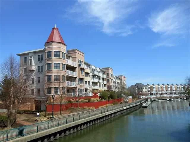 Port Liberte Luxury Condominium, Upscale Community outside of Manhattan, Amazing 3 Bedroom 2 Full Bath and Huge Terrace off Living Room, Over Looking Canal with Boat Slip,  Hardwood Floor Thru out, California Closets, Washer Dryer in Apt, Modern Kitchen w/ Granite Counter Top, Unique Large Living Room and Dinning Area, Great for Entertaining, Underground Parking, Outdoor Pools, Tennis Court, Gym, Gated Community, Broad walk Along the Complex, NY Waterway Ferry at Doorsteps, Shuttle to PATH, Don't Miss Out!