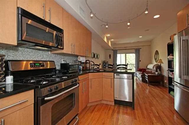 Stunning one bedroom with hardwood floors throughout. Kitchen features stainless steel appliances, granite countertops and breakfast bar. Central air and washer/dryer in unit. Enjoy your own terrace off the living room large enough for entertaining! Second floor unit- just one flight up.