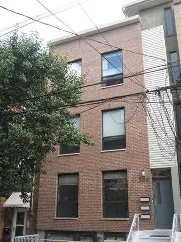 6yrs old, 805 sq ft, very well kept, sunny, contemporary designed unit in the heart of JC downtown, close to Grove Street Path station.Unit features white oak hardwood floors through out, all SS appliances, quart counter tops and lots of cabinets in the kitchen.Spa bathroom with glass cabinets & porcelain tiles. Unit has a semi-private deck for Al-Fresco dining and overlooking to a beautiful landscaped Zen garden. Relax on your shared roof top deck with NYC views.Close to restaurants, parks and shops.