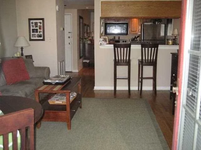 Great midtown location! This two room studio feels larger than some one bedrooms. Unit features nice open living/dining area with large terrace, hardwood floors, and new central air system. Low maintenance and taxes! Perfect for first time home buyer or investor! Bus at corner to PATH one block to NYC bus transportation!