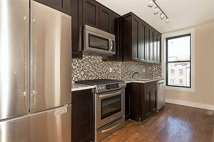 Newly renovated 2 bed 1 bath located on one of Hoboken's most desirable streets. Amenities include beautiful hardwood floors, modern kitchen with granite counter tops, SS appliances, gracious floor plan, central air/heat , and washer/dryer in unit. Easy access to NYC transportation and Hoboken restaurants.