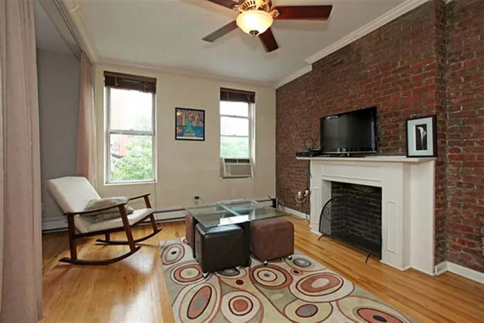 GREAT DOWNTOWN LOCATION! 2 BEDROOM(LARGER MASTER).1 BATH, PLUS STUDY. EAST/WEST LIGHT. 2ND FLOOR! RENOVATED KITCHEN W/GRANITE BREAKFAST BAR/SS APPLIANCES(BOSCH/GE). 9 FT. CEILINGS WITH EXPOSED BRICK, HWF. NON-WORKING FIREPLACE W/MANTLE. FREE W/D (NEW) IN BLDG. RENTAL PARKING AVAILABLE. LOW MAINTENANCE!
