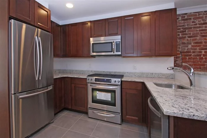 Newly renovated 2 bed 1 bath located on one of Hoboken's most desirable streets. Amenities include modern kitchen with granite counter tops, SS appliances, gracious floor plan, central air/heat , and washer/dryer in unit. AMAZING PRIVATE BACKYARD / Easy access to NYC transportation and Hoboken restaurants.