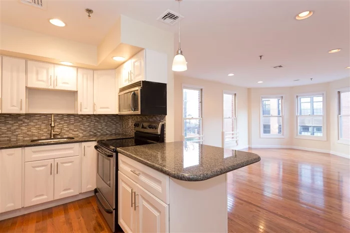 New renovation and incredible location. Located in Paulus Hook on the corner of Essex and Washington St. This 2 BR Condo has the comforts you deserve. Kitchen features ss appliances, and brand new cabinets and granite. Bathroom is also newly renovated. Living room floor was newly refurbished and new floors have been installed in both bedrooms. Parking included. Commuter's dream with light rail, path, and ferry all nearby.