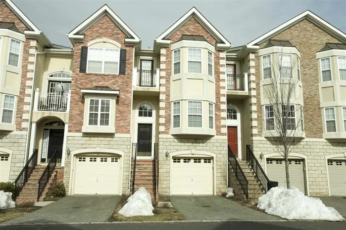 Immaculate 2BR/2.5BTH townhome in Riverside Ct. Gramercy model has all top of the line upgrades. Features 1945 sq.ft. of luxury living with all the bells and whistles. Wide open floor plan w/designer tile throughout main level, wall to wall carpet upstairs and in the rec room, gas fireplace in living room and gourmet kitchen w/granite tops, island and stainless steel appliances. Complex offers an in-ground pool, and is a commuter's dream w/ NYC bus at gate and shuttle to PATH for NYC!