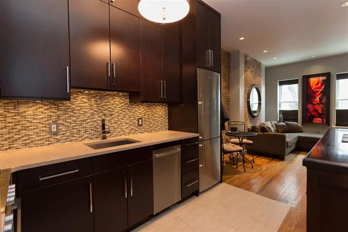 Fantastic one bedroom renovated summer 2012. Kitchen features quartz counters, ss appliances and custom cabinets. Other features include hardwood floors, exposed brick, common yard and common storage. Don't miss out on great opportunity!