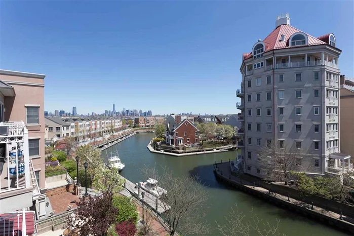 Port Liberte Luxury Duplex w/views of canal, NYC skyline, Hudson River& Statue of Liberty. Chefs kitchen features granite counters & an abundance of cabinets. Huge living& dining area allows for comfortable living and has the space for an entertainers delight. Master suite features an oversized br w/ large walk-in closet w/ custom organizers. Relax on either of your 2 private balconies. Gated community features play area, tennis court, gym& pool area. Ferry to NYC at your doorstep or private shuttle to PATH