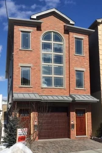 JUST COMPLETED CONTEMPORARY URBAN LIVING IN BRAND NEW CONSTRUCTION. DUPLEX STYLED CONDO IN PRIME LOC, 1/2 BLOCK TO NYC TRANS. 1600 SQ',  3 BEDRMS + 2 1/2 BATHS. QUALITY DESIGNS INCL HARDWD & TILED FLRS, GOURMET KITCHEN & ISLAND, QUARTZ COUNTERTOP, PORCELAIN TILED BATHRMS W/SOAKER TUB/GLASS ENCLOSED SPA RAIN SHOWER, CROWN MOLDINGS, CENTRAL A/C, VACUUM & INTERCOM SYSTEMS. LIVING RM OVERLOOKS 19' ATRIUM ACCENTED BY 16' WINDOWS OF GORGEOUS LIGHT. 16 X 16 ROOFTOP TERRACE PERFECT FOR ENTERTAINING!