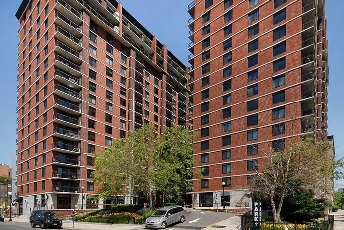 Beautiful 2br/2ba SW corner unit in the Sky Club. Unit features, kitchen with lots of cabinet space, d/w, s/s appliances, breakfast bar and h/w floors. W/D conveniently in unit. Large living room w/separate dining area. Master bedroom with ensuite bath. 2nd bedroom with walk-in closet. Enjoy your balcony with sunset views. Bldg offers: 24hr concierge, courtyard, elevator, free shuttle to/from PATH, steps to NYC buses, LightRail and more! Onsite 25, 000 sq ft gym & garage parking offered for additional fee.