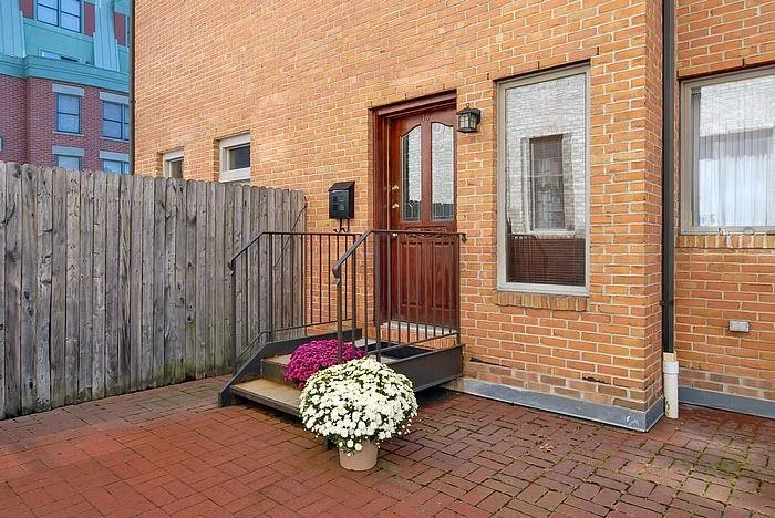 Come discover this peaceful gated community surrounded by all that Hoboken has to offer. Presenting a wonderful multi-level townhouse in Robert's Court with 1834 sq ft of living space and attached single car garage plus driveway space for a second. Features include private 200 sq ft patio, stylishly remodeled SS/granite kitchen, c/a/c, in home laundry, fireplace, oak flooring, 2nd terrace, and skylighted loft as a 3rd bedroom. Complex offers landscaped courtyard and fitness room. The perfect city home!